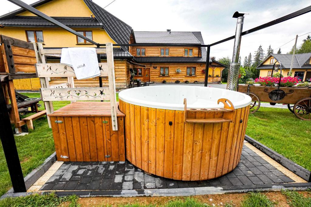 غرفة ثلاثية كلاسيكية في Gościniec Kukułka z Jacuzzi